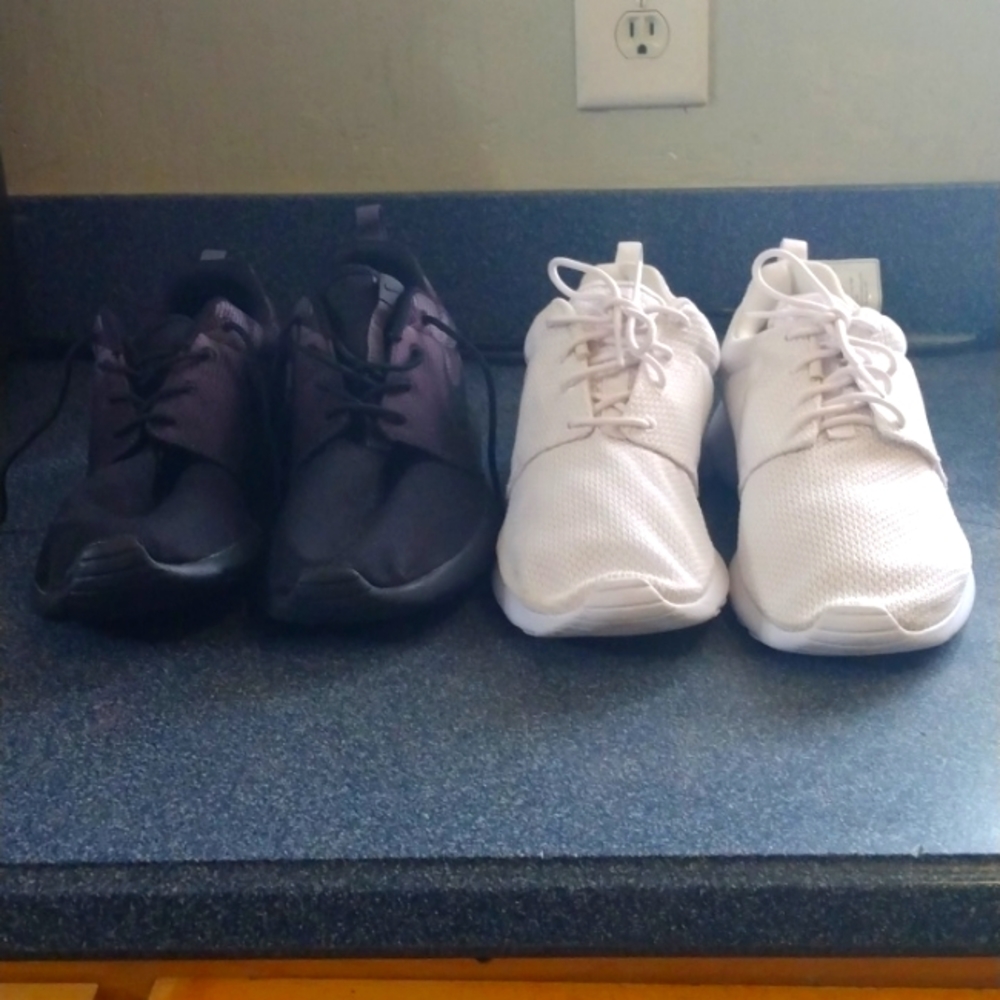 2 pair of Nikes white and black